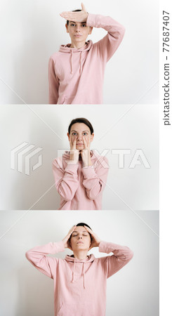 Beautiful young millennial woman doing face yoga at home. Fascial exercises for building youthful Beautiful young millennial woman doing face yoga at home. Fascial exercises for building youthful 77687407