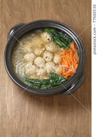 Meat dumplings and vermicelli soup boiled, Chinese-style hot pot Meat dumplings and vermicelli soup boiled, Chinese-style hot pot 77688538