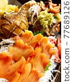 Fresh and vivid ark shells and whelk shells 77689126