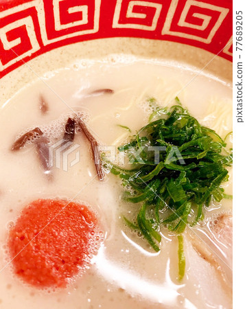 Hakata tonkotsu ramen with vivid color contrast Hakata tonkotsu ramen with vivid color contrast 77689205
