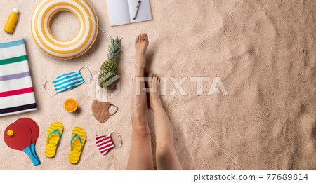 Flat lay top view of young woman with travel essentials, summer holiday concept. Copy space. 77689814