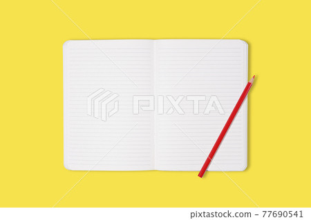 School or office notebook with red pencil isolaed on yellow background. Top view. Mock up. School or office notebook with red pencil isolaed on yellow background. Top view. Mock up. 77690541