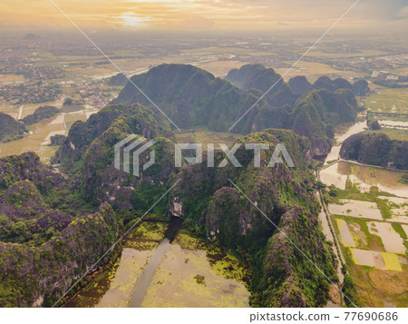 the majestic scenery on Ngo Dong river in Tam Coc Bich Dong view from drone in Ninh Binh province of Viet Nam 77690686