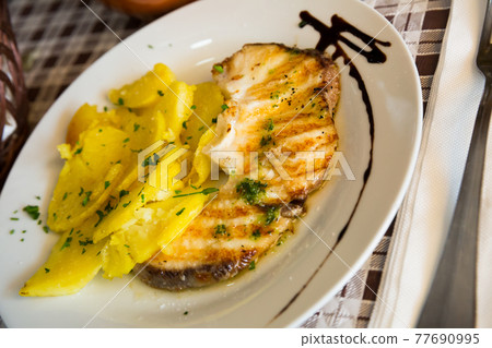 Roasted shark steak with salsa verde Roasted shark steak with salsa verde 77690995
