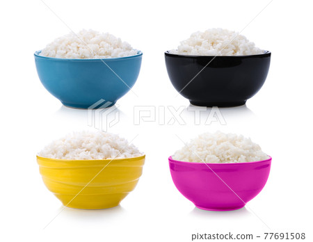 Rice in a bowl on white background 77691508
