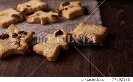 Healthy homemade cookies on wooden background 77692188