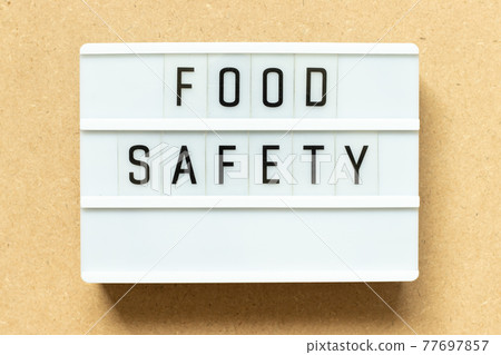 Lightbox with word food safety on wood background Lightbox with word food safety on wood background 77697857