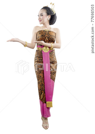 Asian woman with Java traditional dance costume showing something Asian woman with Java traditional dance costume showing something 77698503