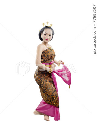 Asian woman dancing Java traditional dance (Sekar Puri dance) Asian woman dancing Java traditional dance (Sekar Puri dance) 77698507