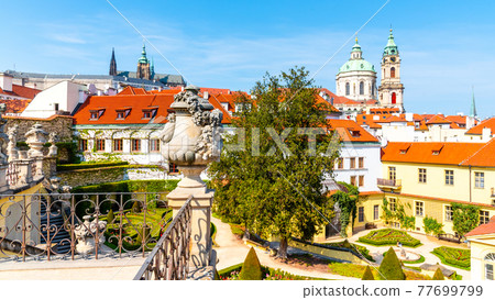 Prague Castle and St Nicholas Church in Lesser Town of Prague. Sunny spring day view from Vrtba Garden. Prague, Czech Republic Prague Castle and St Nicholas Church in Lesser Town of Prague. Sunny spring day view from Vrtba Garden. Prague, Czech Republic 77699799