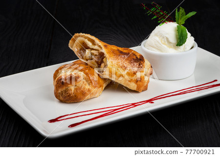 Apple strudel with vanilla ice cream Apple strudel with vanilla ice cream 77700921