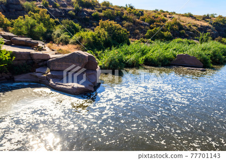 View of Tokovsky waterfalls on the Kamenka river in Dnipropetrovsk region, Ukraine 77701143
