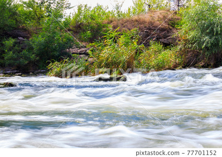 Rapids on the Inhulets river in Kryvyi Rih, Ukraine 77701152