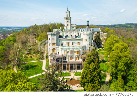 Aerial view on the castle in Hluboka nad Vltavou, historic chateau with beautiful gardens near Ceske Budejovice, Czech Republic Aerial view on the castle in Hluboka nad Vltavou, historic chateau with beautiful gardens near Ceske Budejovice, Czech Republic 77703173