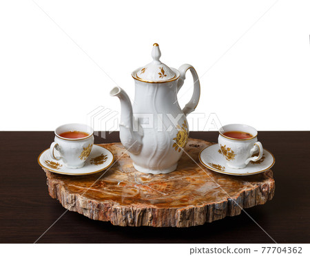 Elegant coffee set on an exclusive tray Elegant coffee set on an exclusive tray 77704362