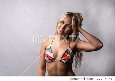 beuatiful young teen blonde girl wearing a bikini. Stock Photo