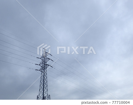 Cloudy sky and power lines Cloudy sky and power lines 77710004
