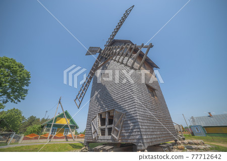 old windmill by the lake. old windmill by the lake. 77712642