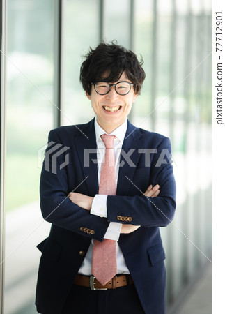 Businessman portrait outdoors Businessman portrait outdoors 77712901