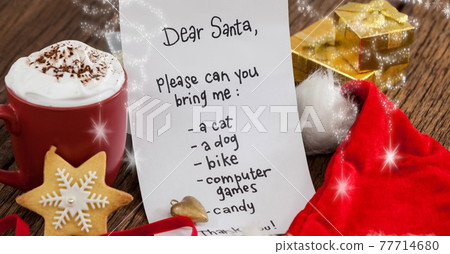 Composition of letter to santa over santa claus hat and christmas decorations 77714680