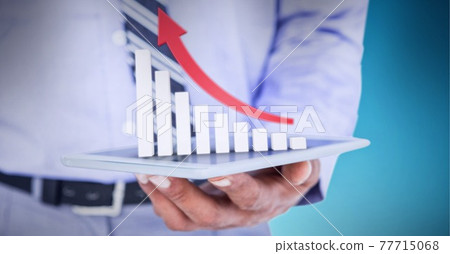 Statistical data processing over mid section of businessman holding digital tablet Statistical data processing over mid section of businessman holding digital tablet 77715068