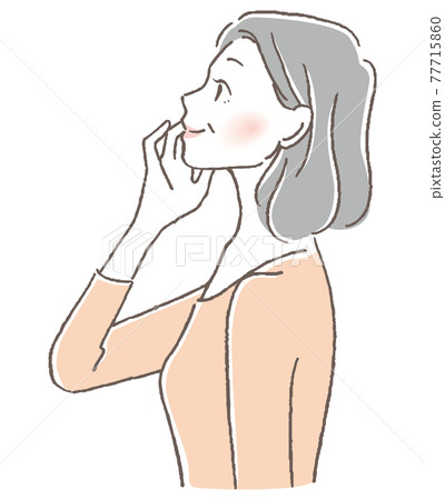 Senior woman putting her hand on her cheek 77715860