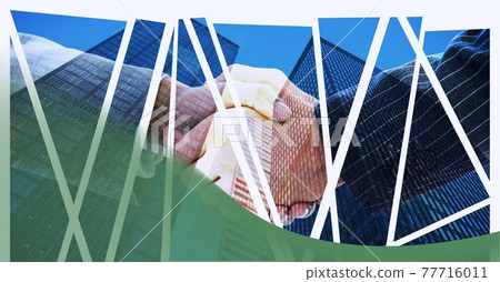 Technology background over mid section of two businessmen shaking hands against tall buildings 77716011