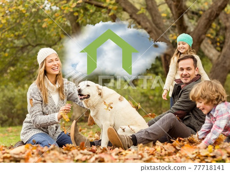 Composition of cloud with house icon over happy caucasian family with dog in autumn park 77718141