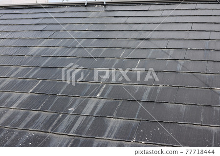Image of painful slate roof 77718444