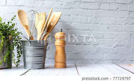 Kitchen tools and kitchenware utensil object with ingredients on kitchen shelf wood white  77729797