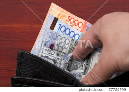 Kazakhstani money - tenge in the wallet 77729799