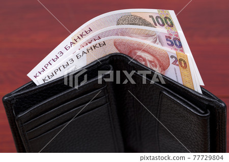 Old Kyrgyzstani money - som in the wallet 77729804