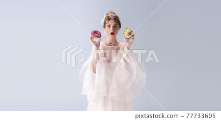 Young woman in art action isolated on white background. Retro style, comparison of eras concept. 77733605