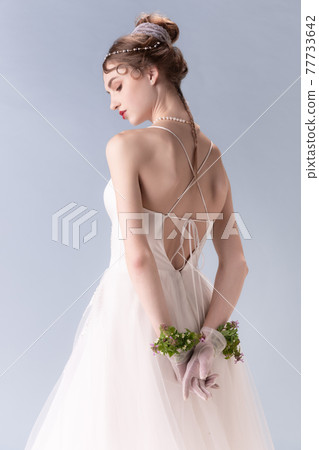 Young woman in art action isolated on white background. Retro style, comparison of eras concept. 77733642