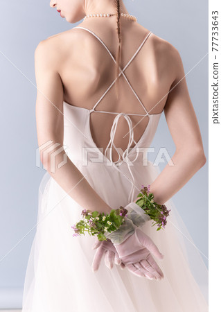 Young woman in art action isolated on white background. Retro style, comparison of eras concept. Young woman in art action isolated on white background. Retro style, comparison of eras concept. 77733643