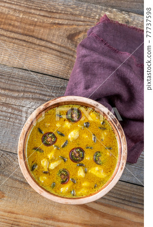 Bowl of yellow curry Bowl of yellow curry 77737598