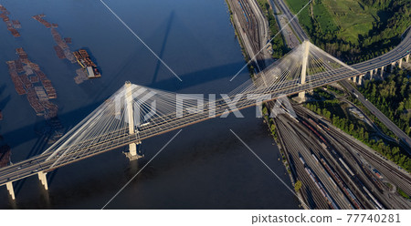 Aerial view on Fraser River and Port Mann Bridge 77740281