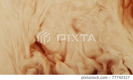 Milk being pour into coffee drink. 77740327