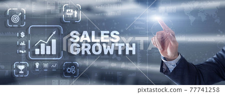 Sales Growth Man clicks inscription on virtual 3D screen Sales Growth Man clicks inscription on virtual 3D screen 77741258
