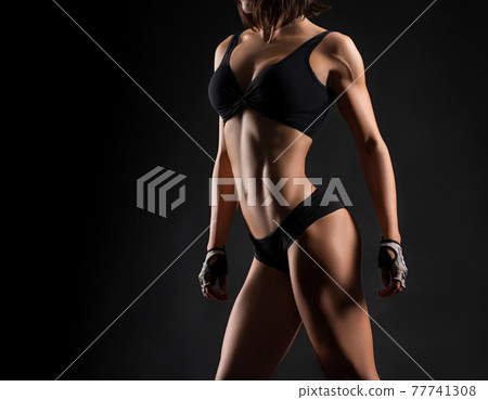 Fitness woman studio shots Fitness woman studio shots 77741308