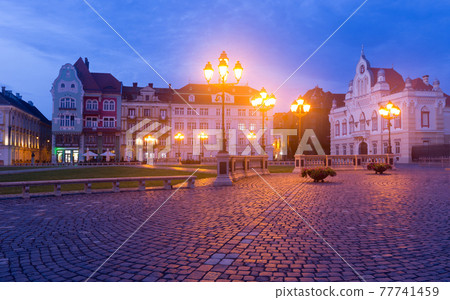 Unirii Square in Timisoara in dusk Unirii Square in Timisoara in dusk 77741459