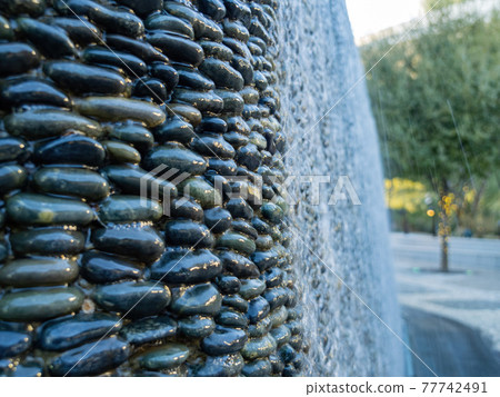 Close up shot of a rock waterfall 77742491