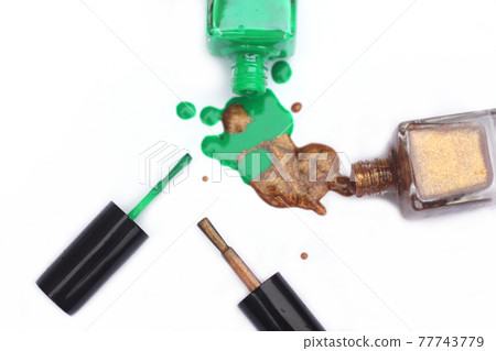 Green and Gold Nail polish Spilled Green and Gold Nail polish Spilled 77743779