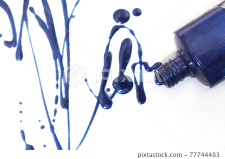 Spilled Blue Nail polish on White 77744483