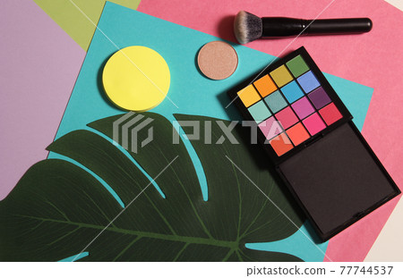 Cosmetics on Paper With Tropical Leaf Cosmetics on Paper With Tropical Leaf 77744537