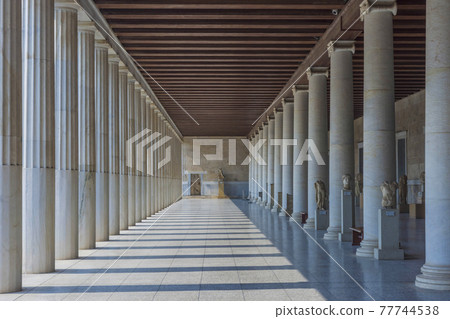 Beautiful column arcades of the Stoa of Attalos building, an ancient commercial center, currently houses the Museum of the Ancient Agora 77744538