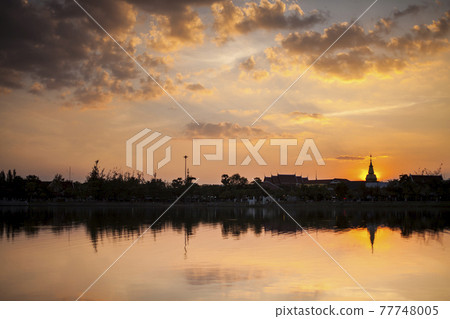 Silhouette of pagoda  on sunset sky background 77748005
