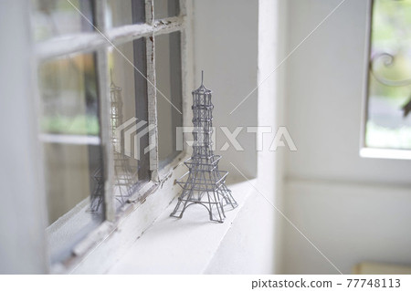 An image of a tower accessory by a bright window An image of a tower accessory by a bright window 77748113