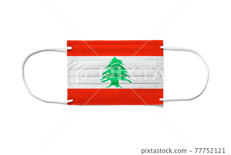 Flag of Lebanon on a disposable surgical mask. White background Flag of Lebanon on a disposable surgical mask. White background 77752121