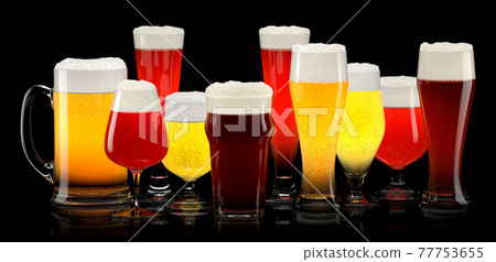 Set of fresh different beer glasses with bubble froth on black background. 77753655